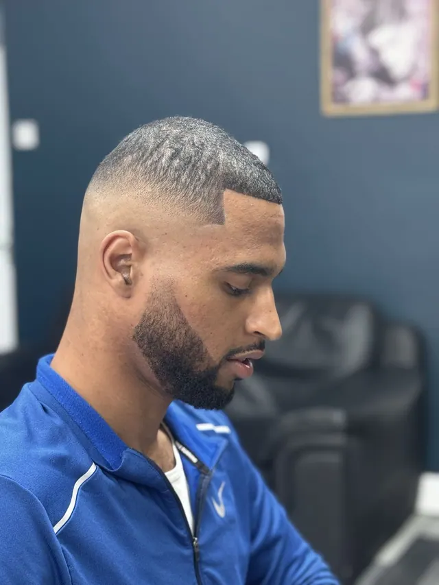 A skin fade and beard at Ezel Cutz